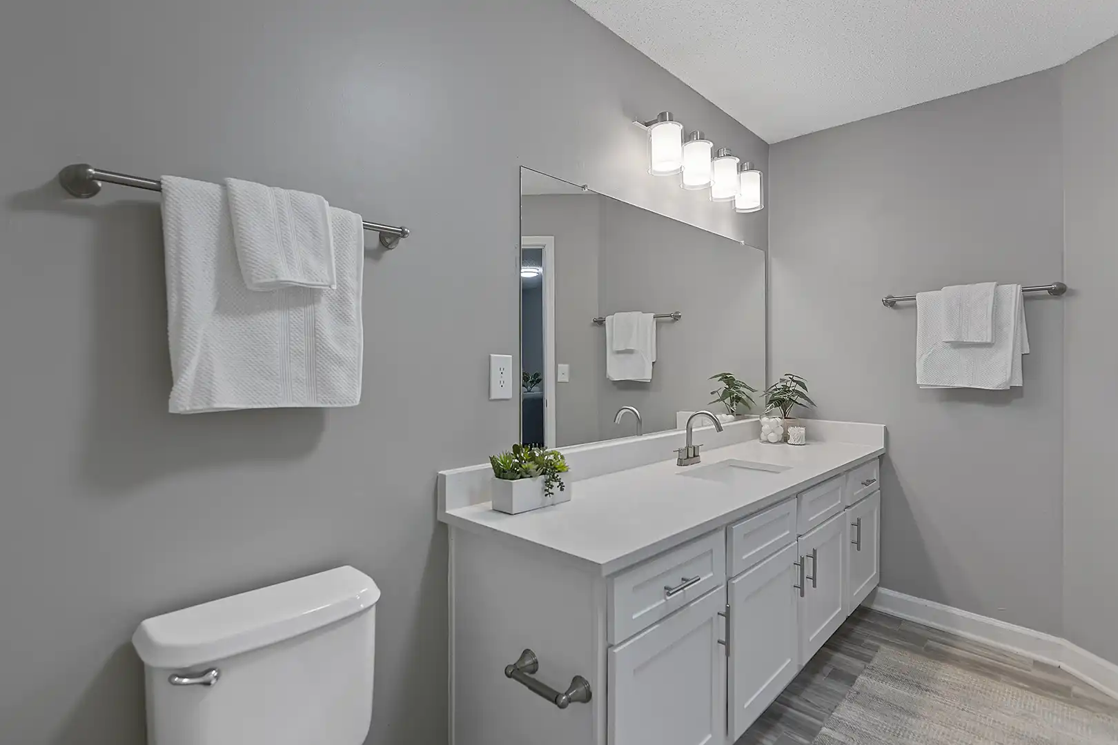 upgraded bathroom with modern towel racks